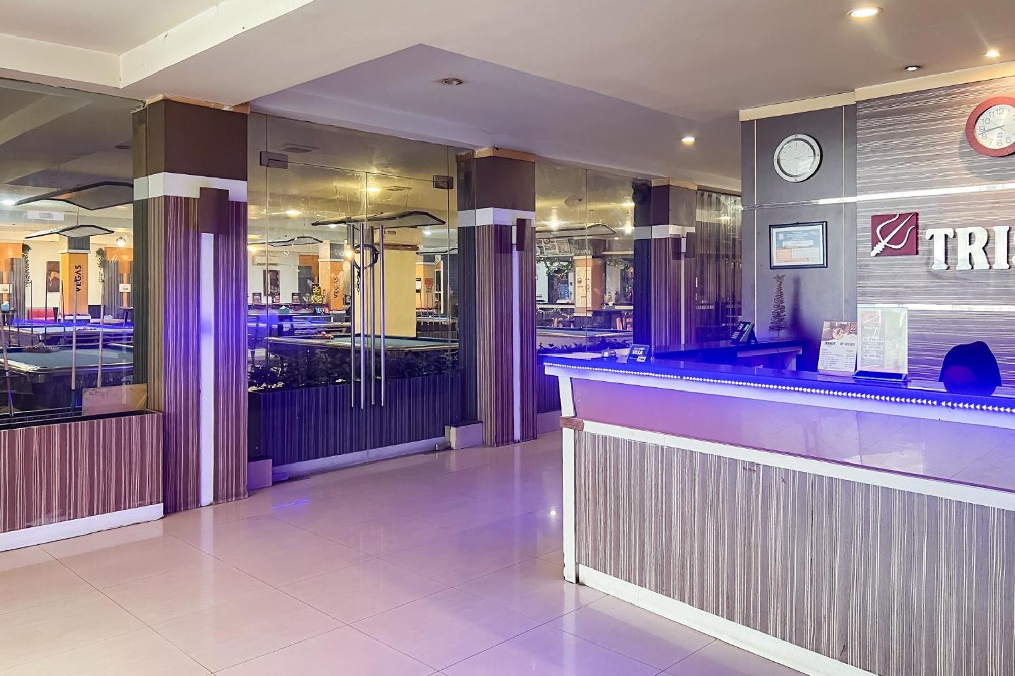 Urbanview Trisula Hotel Макасар Экстерьер фото